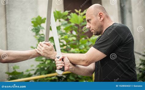 Eskrima And Kapap Instructor Demonstrates Machete Weapon Fighting Technique Stock Image ...