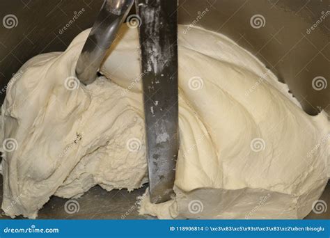 Kneading Dough. Mixing Dough Kneading Machine. Pizza Dough Stock Photo - Image of knead ...