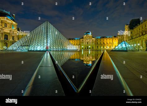 Louvre museum at night, Paris, France Stock Photo - Alamy