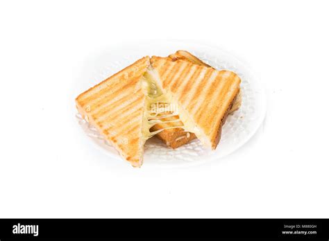 Toast sandwich with cheese isolated on white Stock Photo - Alamy