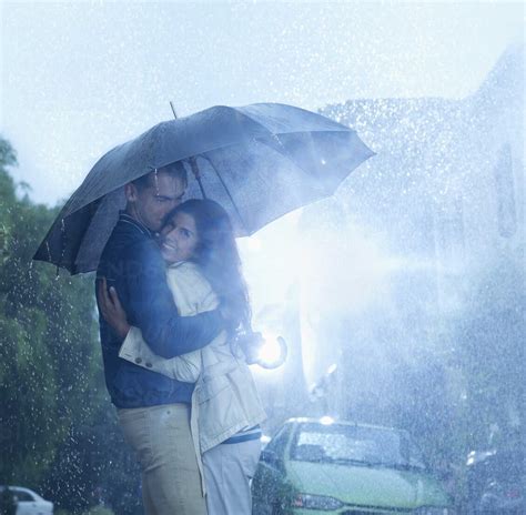 Couple Hug In Rain