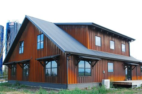 an image of a house that is made out of wood and has metal roofing