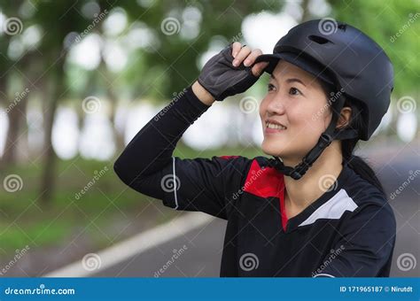 Women wearing Bike Helmet stock image. Image of smile - 171965187