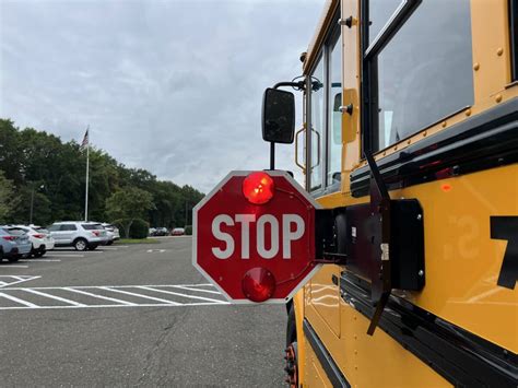 Failure to heed a school bus with red flashing lights endangers kids ...