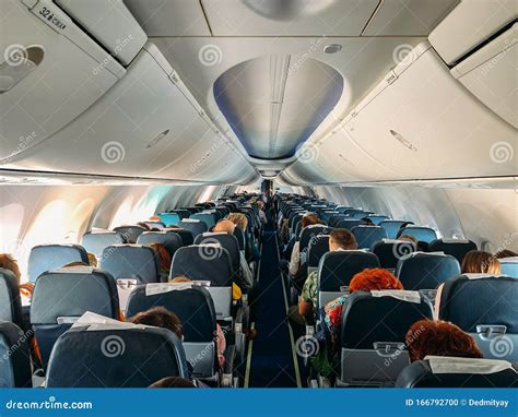 Airplane Interior Inside with Passengers in Flight Stock Photo - Image of comfortable, airplane ...