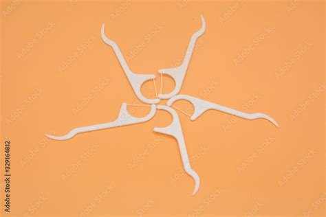 toothpick and dental floss isolated Stock Photo | Adobe Stock