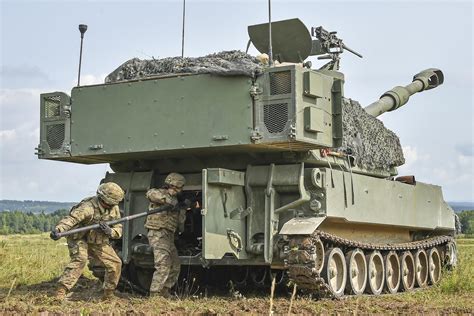 Soldiers conduct a fire coordination exercise with an M109A6 Paladin at the Grafenwoehr Training ...