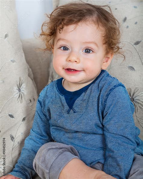 Newborn Baby Boy With Curly Hair