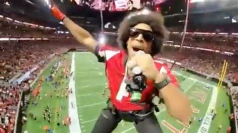 Ludacris Performs While Descending from Atlanta Falcons' Stadium Roof