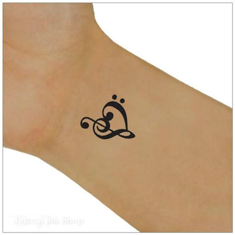 Share more than 77 bass clef and treble clef tattoo best - in.cdgdbentre