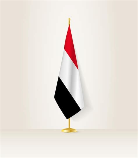 Premium Vector | Yemen flag on a flag stand