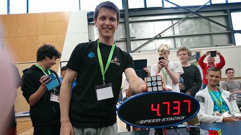 Rubik's Cube Champion Sets New World Record Solving a Rubik's Cube in Just 4.737 Seconds