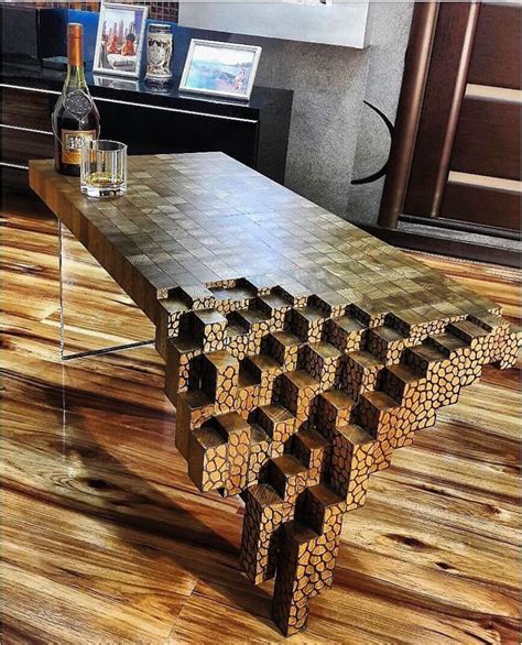 a table made out of pieces of wood and some wine bottles on top of it