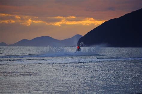 Sunset on the Beach. Water Sport, Practicing Jet Ski on Sunset Stock Photo - Image of reddish ...