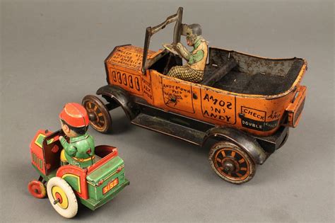 Lot 736: 2 tin litho Wind-Up Toy Cars | Case Auctions