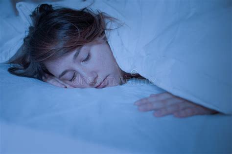 Woman Sleeping with Closed Eyes at Night Stock Image - Image of adult, person: 132943917