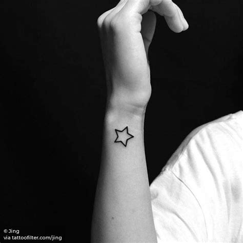 Star outline tattoo on the wrist. Small Symbol Tattoos, Small Star Tattoos, Hand Tattoos For ...