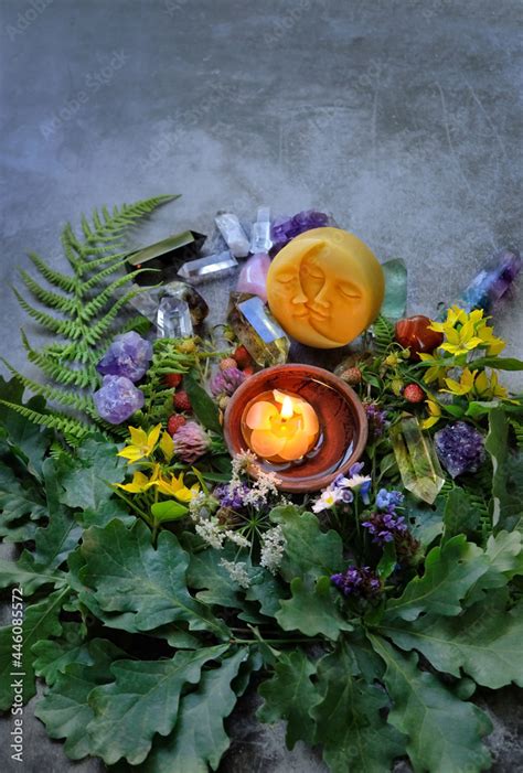 witch altar with candle, gemstones, fern and oak leaves. Wiccan Altar ...