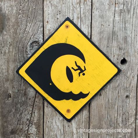 High surf stickman warning sign, in black on yellow. great classic ...