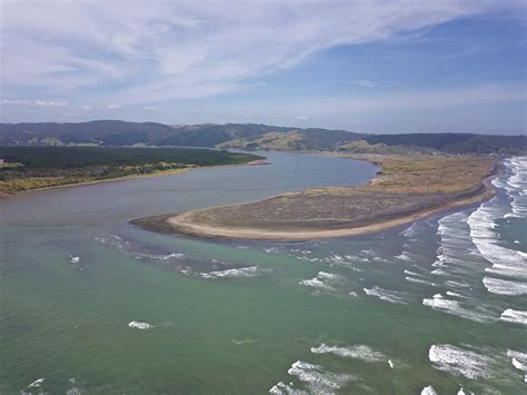 Where the Waikato River meets the Tasman Sea : r/newzealand