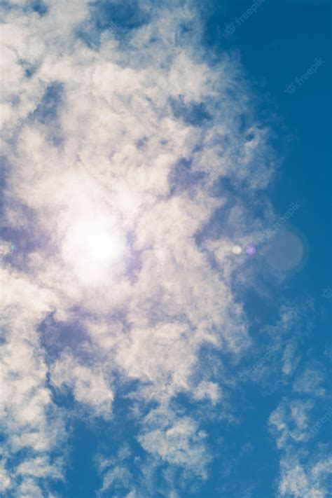 Premium Photo | Blue sky with clouds and sun