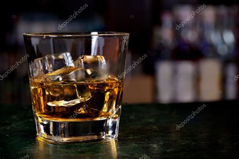 Glass of scotch whiskey Stock Photo by ©gresey 20616811