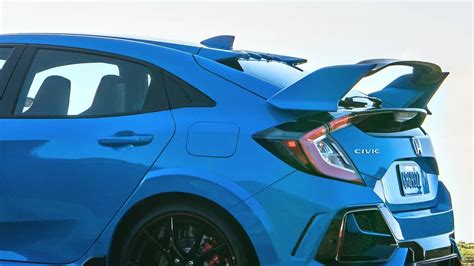 Wings On The Back Of Cars - Performance or Posing? | Torque News