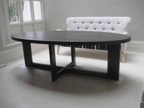 Black Oak oval dining table. - Alex Brooks Furniture