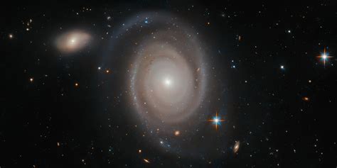 Hubble Space Telescope Spots a Galaxy – And It’s Not Alone