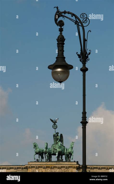 Quadriga sculpture designed by Johann Gottfried Schadow atop Brandenburg Gate, across old ...