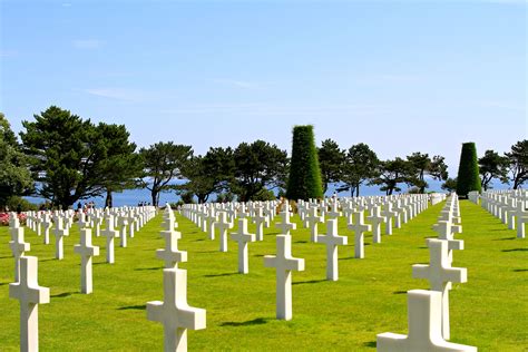 Surreal place. Normandy American Cemetery & Memorial in France above the beaches. American ...