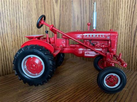 McCormick Farmall Toy Tractor - Metzger Property Services LLC