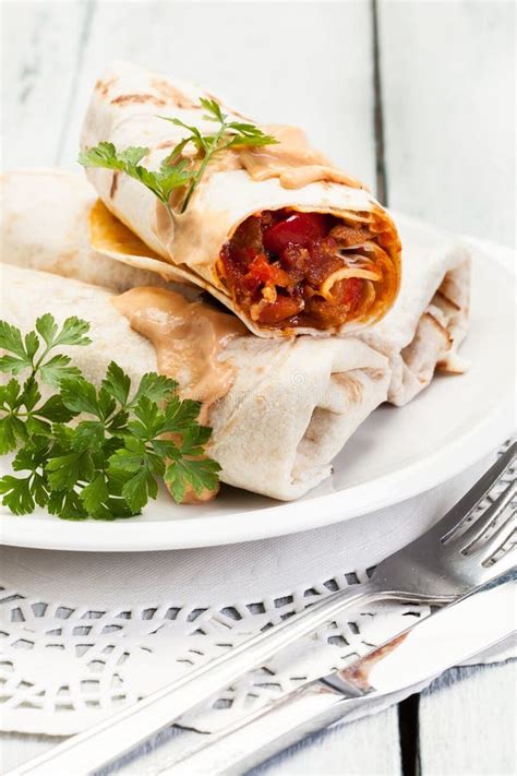 Burritos on Red Plate with Spicy Salsa and Chili Powder Stock Photo - Image of burrito, food ...