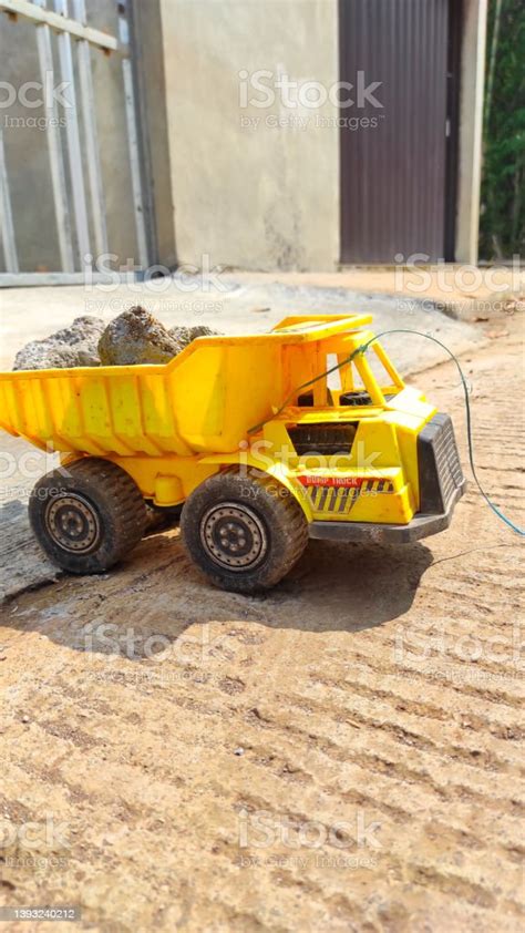 Yellow Dump Truck Toy Stock Photo Stock Photo - Download Image Now - Activity, Agricultural ...