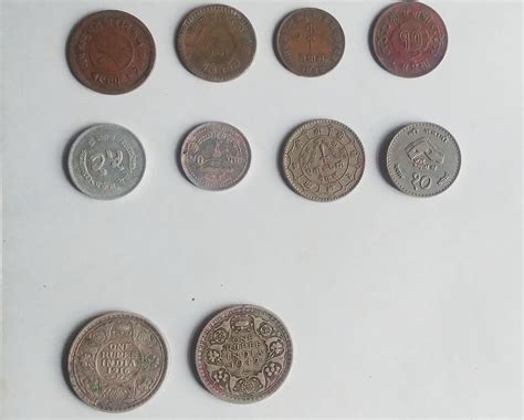 A collection of old Nepali and Indian coins I have. : r/Nepal