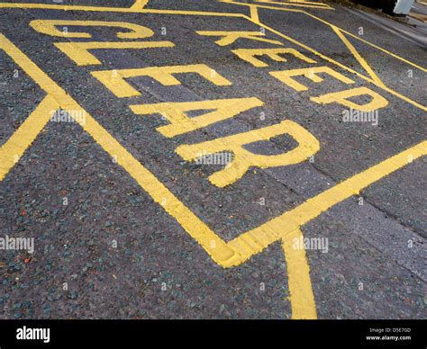 Yellow keep clear road sign hi-res stock photography and images - Alamy