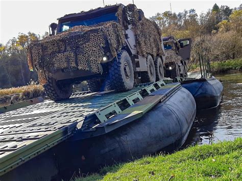 SNAFU!: French VBMR Griffon conducting river crossing ops....