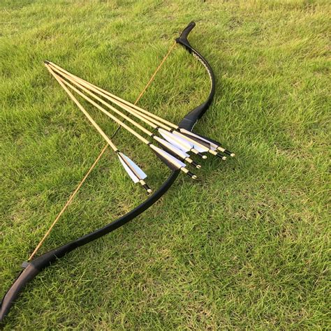 The traditional bow hunting sports archery equipment genuine recurve ...