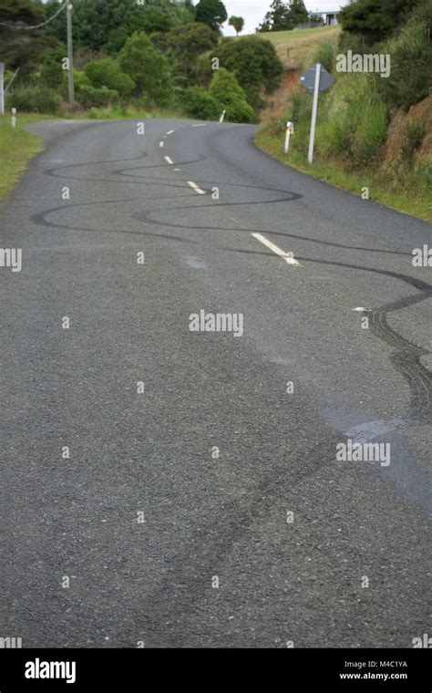 Car Tyre Mark On Road Stock Photo - Alamy