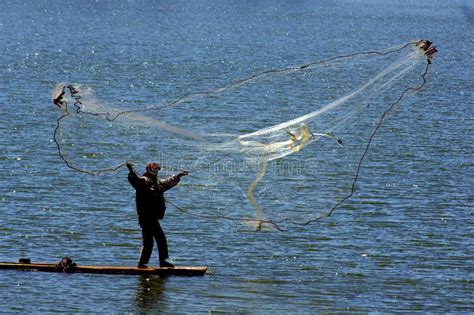 Fisherman Cast Net Fishing In Indonesia Stock Image - Image of thrower, weighted: 44361485