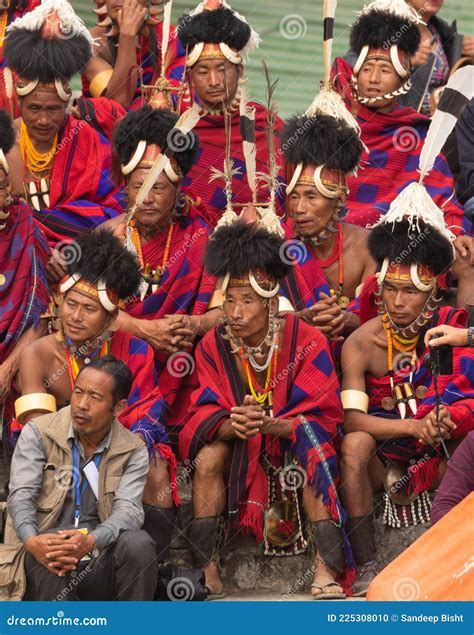 A Group of Naga Tribesmen Siting Wearing Their Traditional Attire ...