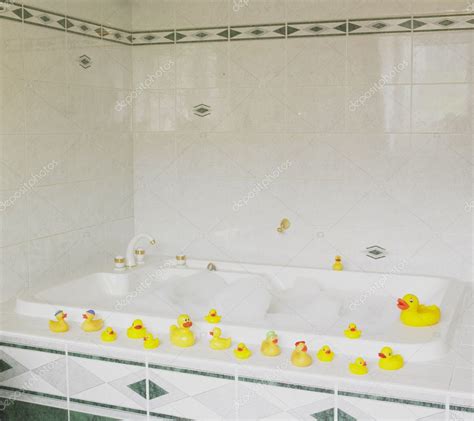 Bath tub with rubber ducks — Stock Photo © phb.cz #4264463