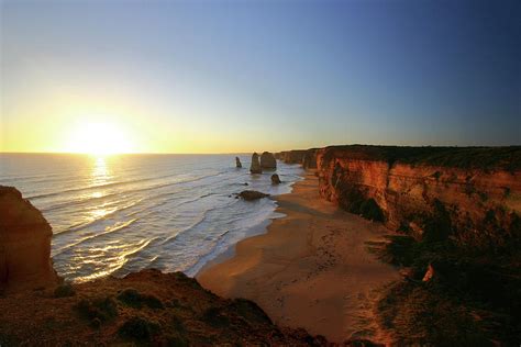 Sunset At The Twelve Apostles Photograph by Timothyball