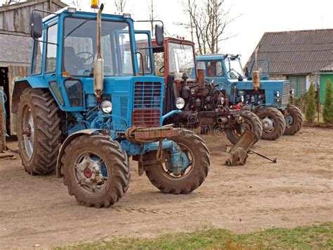 Repairing tractors stock image. Image of yard, close - 24500277