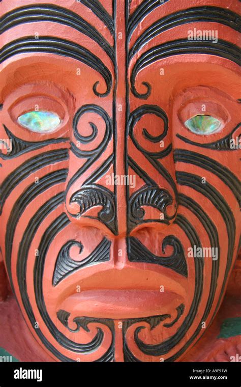 A traditional Maori carving decorating the wall of the Canoe House at Waitangi National Reserve ...