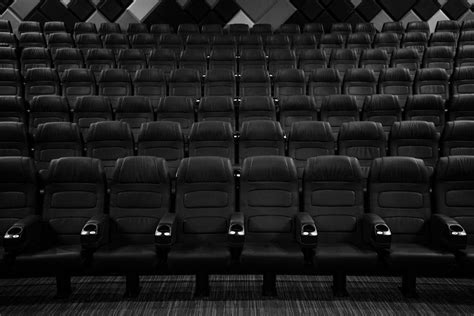 Grayscale Photo of Empty Seats in Movie Theater · Free Stock Photo