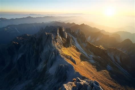 Premium AI Image | Mountain landscape at sunrise View from the top of the mountain