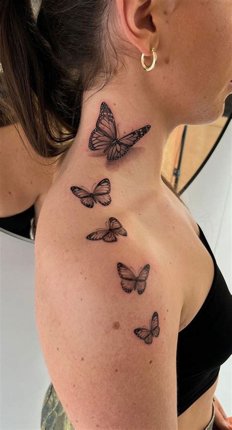 Butterfly Tattoo On Upper Back