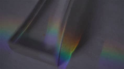 Prisms splitting light - YouTube