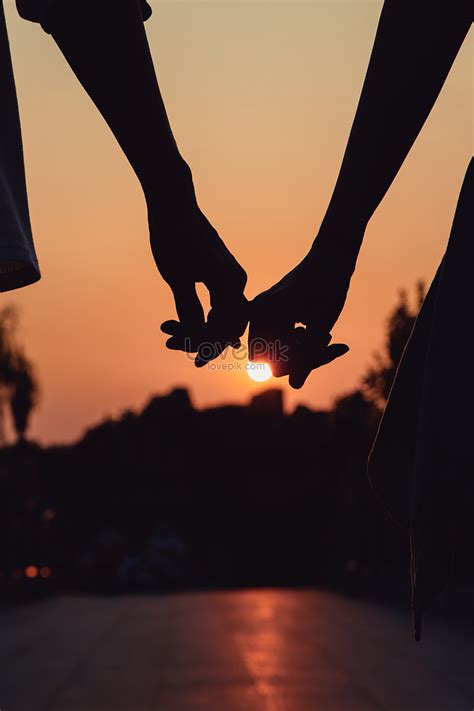 Couple In The Sunset Holding Hands Silhouette Picture And HD Photos ...